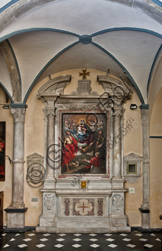 Genoa, Duomo (St. Lawrence Cathedral), inside, Baptistery (formerly Church of St. John the Old): lateral altar with "Madonna and Child, St. John the Baptist, Pierre d'Aubusson and St. Cosmas ", by Paolo Girolamo Piola, oil painting on canvas.