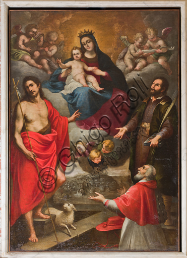 Genova, Duomo (Cattedrale di S. Lorenzo), Interno, Battistero (già Chiesa di San Giovanni il Vecchio): "Madonna con Bambino, S. Giovanni Battista, Pierre d'Aubusson e S. Cosma", di Paolo Girolamo Piola, olio su tela.Nella parte inferiore del dipinto, Pierre d'Aubusson, Gran Maestro dell'Ordine degli Ospitalieri, altrimenti detti Cavalieri di Rodi e poi di Malta, mostra il porto de La Valletta, a Malta.