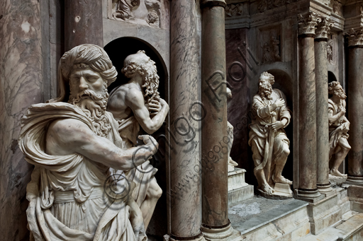 Genoa, Duomo (St. Lawrence Cathedral), inside, Cybo chapel (northern arm of the transept), Funerary Monument of Archbishop Giuliano Cybo: from the left, statues of Abraham in the foreground, and then St. Jerome, St. Peter,  St. John the Baptist, by Giangiacomo and Guglielmo Della Porta, and by Niccolò Da Corte (1533 - 1537).