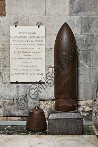 , Genoa, Duomo (St. Lawrence Cathedral), inside, the Southern aisle, southern wall: Copy of the shell bomb that hit the Cathedral on February 9, 1941 failing to detonate.