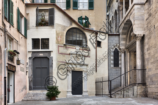 , Genoa, Duomo (St. Lawrence Cathedral): the little square of S. Giovanni il Vecchio and the West side of the Baptistery e the portal of S. Maria della Vittoria (1502-3).