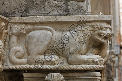 , Genoa, Duomo (St. Lawrence Cathedral), South side, the doorway of St. Gotthard (1155 - 1160), Prothyrum, left capital, dosseret: bicorporate dragons with serpentine tails, by Pisan - Lucchese workshop, “second master” and “second helper” of the doorway of St. Gotthard.