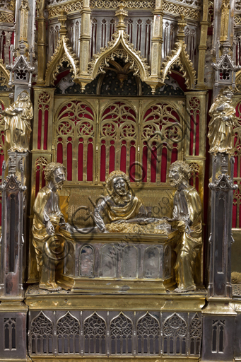   Genoa, Museum of the Treasury of the Cathedral of San Lorenzo: the Ark processional Ash St. John the Baptist. The Ark was commissioned by the Priors Chapel and was built by Teramo Danieli and Simone Caldera, 1438 - 1445, embossed silver, cast, gilt and enamels. The form proposes a Gothic church in miniature, in the central part are the stories of the Precursor: Announcement to Zechariah, Visitation, Birth; Imposition of the name, The Angel leads John in the desert, Preaching, and the Feast of Herod and the Burial. The corners: S. John the Evangelist, St. Matthew, St. George and St. Lawrence.