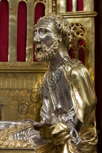   Genoa, Museum of the Treasury of the Cathedral of San Lorenzo: the Ark processional Ash St. John the Baptist. The Ark was commissioned by the Priors Chapel and was built by Teramo Danieli and Simone Caldera, 1438 - 1445, embossed silver, cast, gilt and enamels. The form proposes a Gothic church in miniature, in the central part are the stories of the Precursor: Announcement to Zechariah, Visitation, Birth; Imposition of the name, The Angel leads John in the desert, Preaching, and the Feast of Herod and the Burial. The corners: S. John the Evangelist, St. Matthew, St. George and St. Lawrence.