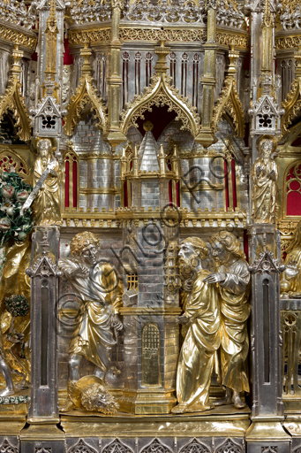   Genoa, Museum of the Treasury of the Cathedral of San Lorenzo: the Ark processional Ash St. John the Baptist. The Ark was commissioned by the Priors Chapel and was built by Teramo Danieli and Simone Caldera, 1438 - 1445, embossed silver, cast, gilt and enamels. The form proposes a Gothic church in miniature, in the central part are the stories of the Precursor: Announcement to Zechariah, Visitation, Birth; Imposition of the name, The Angel leads John in the desert, Preaching, and the Feast of Herod and the Burial. The corners: S. John the Evangelist, St. Matthew, St. George and St. Lawrence.