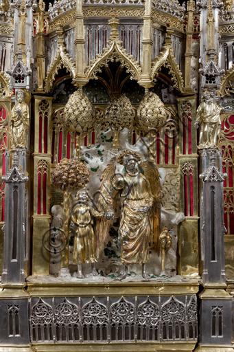   Genoa, Museum of the Treasury of the Cathedral of San Lorenzo: the Ark processional Ash St. John the Baptist. The Ark was commissioned by the Priors Chapel and was built by Teramo Danieli and Simone Caldera, 1438 - 1445, embossed silver, cast, gilt and enamels. The form proposes a Gothic church in miniature, in the central part are the stories of the Precursor: Announcement to Zechariah, Visitation, Birth; Imposition of the name, The Angel leads John in the desert, Preaching, and the Feast of Herod and the Burial. The corners: S. John the Evangelist, St. Matthew, St. George and St. Lawrence.