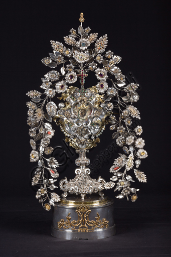   Genoa, Museum of the Treasury of the Cathedral of San Lorenzo: Reliquiary known as the hair of the Virgin; Genoa silversmiths; 18th century; cast, embossed, gilded silver with gems and enamels.