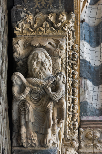 , Genoa, Duomo (St. Lawrence Cathedral), West side, the façade, the main doorway, right jamb, corbel: "Jacob blesse Ephraim and Manasses and two angels", by Master of the Ark of the Baptist, about 1225.