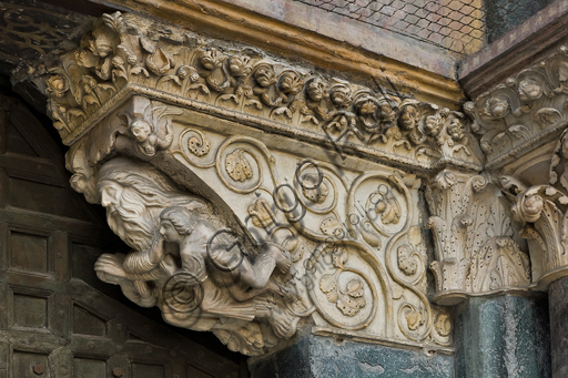 , Genoa, Duomo (St. Lawrence Cathedral), West side, the façade, the main doorway, right jamb, corbel: "Jacob blesse Ephraim and Manasses and two angels", by Master of the Ark of the Baptist, about 1225.