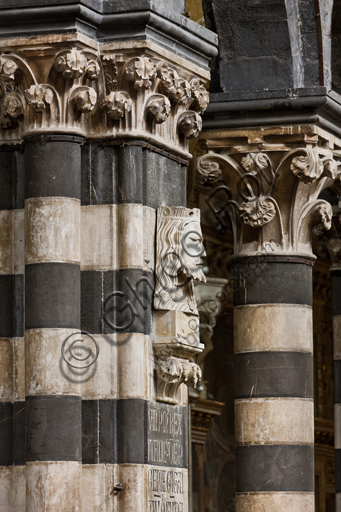 , Genoa, Duomo (St. Lawrence Cathedral), inside, the nave, left matroneum, upper order: "King Janus", (1307) by Campionese sculptor known as Master of Janus.