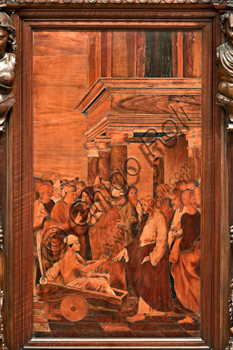 , Genoa, Duomo (St. Lawrence Cathedral), inside,  presbitery, apse, choir, South side: "The Healing of the cripple", wood intarsia by  Gian Michele De' Pantaleoni (XVI century).