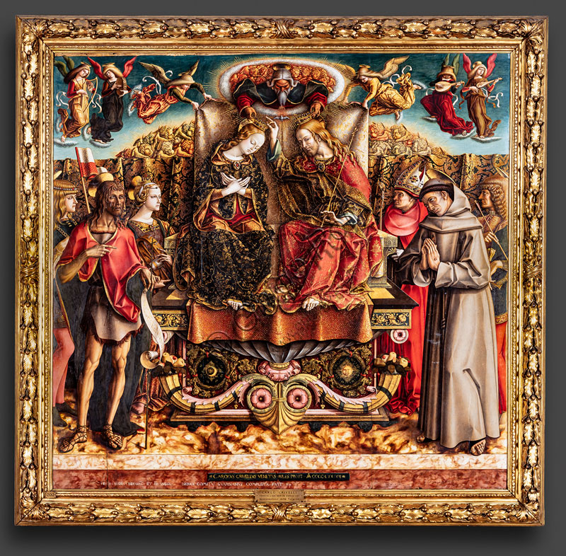 "Coronation of the Virgin Mary with the Trinity, musician angels, St. Venanzio, St. John the Baptist, St. Catherine of Alexandria, St. Augustine, St. Francis of Assisi and St. Sebastian", altarpiece by Carlo Crivelli, late 15th century .