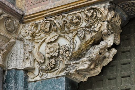 , Genoa, Duomo (St. Lawrence Cathedral), West side, the façade, the main doorway, left jamb, corbel: "Ecclesia feeding the Apostles Peter and Paul and two angels", by Master of the Ark of the Baptist, about 1225.