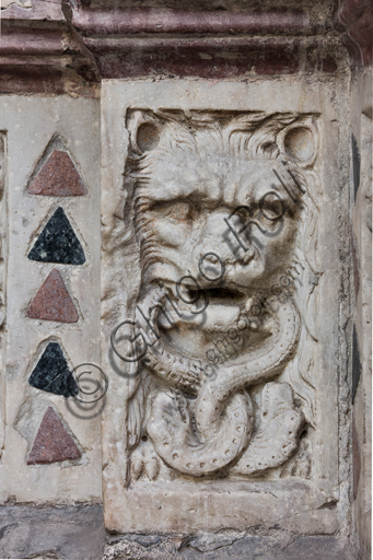 , Genoa, Duomo (St. Lawrence Cathedral), West side, the façade, the main doorway: "Lion devouring serpents", by Master of the Ark of the Baptist (about 1225), figured panel of the base decoration.