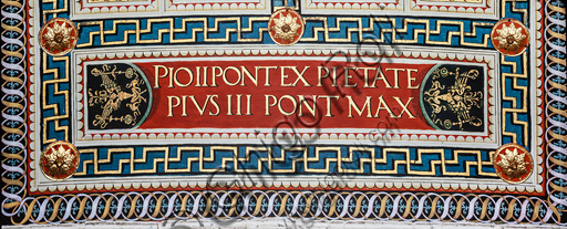 The Piccolomini Library, the ceiling: dedicatory inscription along the short south-east side, fresco by Bernardino di Betto, known as Pinturicchio.
