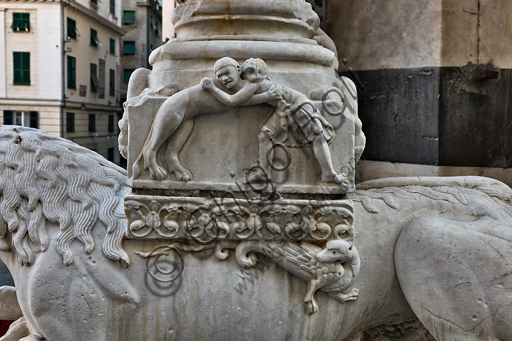 , Genoa, Duomo (St. Lawrence Cathedral), the façade, right portion: detail of the "base of the column with a man fighting a lioness", by workshop of Benedetto Antelami and Master of the Ark of the Baptist, about 1200.