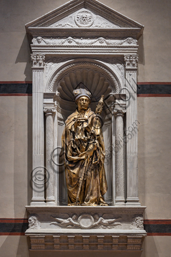 Basilica of the Holy Cross: "St. Louis of Toulouse", 1422-5, by Donatello. The statue is in gilt bronze; the tiara is in silver, gilt bronze, enamel and crystal rock.