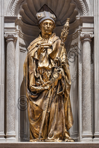 Basilica of the Holy Cross: "St. Louis of Toulouse", 1422-5, by Donatello. The statue is in gilt bronze; the tiara is in silver, gilt bronze, enamel and crystal rock.