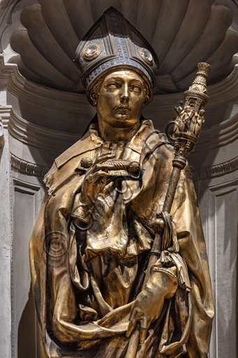 Basilica of the Holy Cross: "St. Louis of Toulouse", 1422-5, by Donatello. The statue is in gilt bronze; the tiara is in silver, gilt bronze, enamel and crystal rock.Detail.