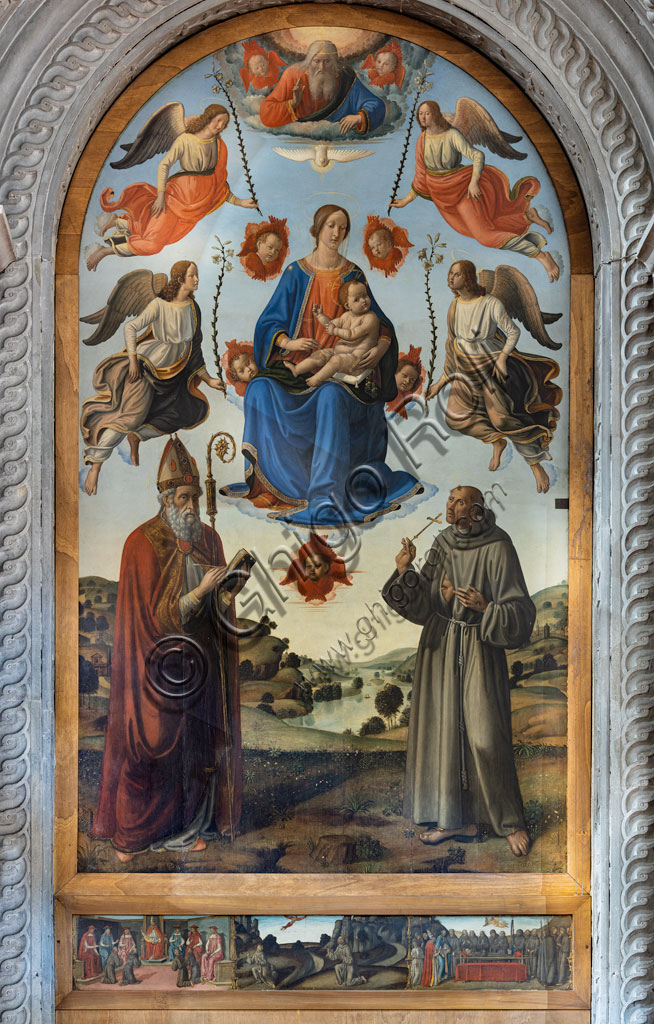 “Madonna with Child in glory, Saint Ambrose, Saint Francis of Assisi, God the Father and angels”. Altarpiece by Cosimo Rosselli, (1498-1501).Florence, Church of St. Ambrose.