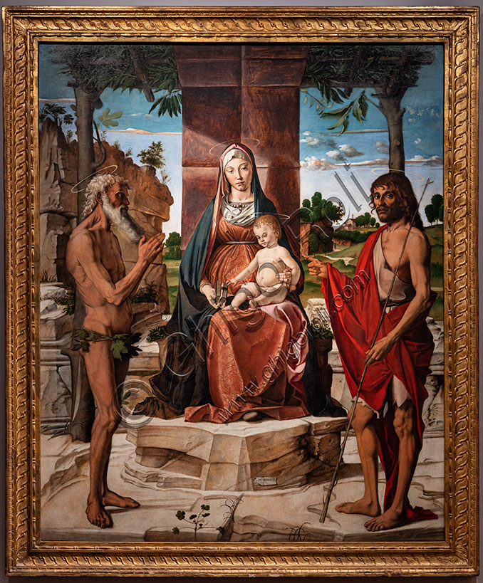 “Madonna with infant Jesus under a pergola among Saints John the Baptist and Onuphrius”, by Bartolomeo Montagna, oil painting on panel, 1485-6.
