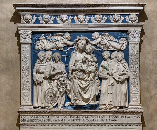 Basilica of the Holy Cross, Medici Chapel: "The Virgin Mary with Infant Jesys between Angels and Saints", about 1480, by Andrea Della Robbia, glazed terracotta.