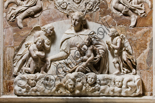 , Genoa, Duomo (St. Lawrence Cathedral), inside, the Southern aisle, the Southern wall: "Madonna with Infat Jesus between Infant St. John and angels", (beginning 16th century), detail of the marble altar by Genoese workers and Tommaso Orsolino.