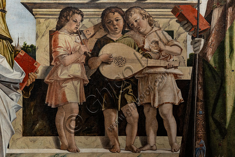 “Madonna in trono con Bambino  tra i santi Giovanni Battista, Bartolomeo, Agostino, Sebastiano e tre angeli musici”, di Bartolomeo Montagna, dipinto a olio, 1485. Particolare.
