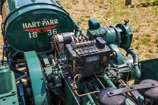 Old tractor. Detail.Make: Hart ParrModel: 18/36Year: about 1920Fuel: crude oil and/or gasolineNumber of Cylinders: 2Displacement: about 7/8.000 ccHorse Power: 18 HP at the wheel and 38 HP  at the PTO (Power Take-Off)Characteristics: The only complete tractor of this model in Europe