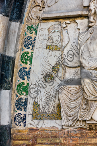 , Genoa, Duomo (St. Lawrence Cathedral), West side, the façade, the main doorway: detail of the lunette with "The Martyrdom of St. Lawrence", by Master of lunette of the Genoa Cathedral, 1225.Detail of "Justinus welcoming Trifonia".