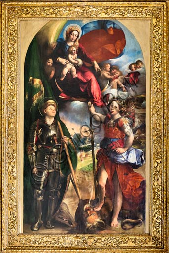  Modena, Galleria Estense: "Madonna with Infant Jesus and St. George and St. Michael Archangel" (about 1518), by  Giovanni Luteri, known as Dosso Dossi. Oil painting.