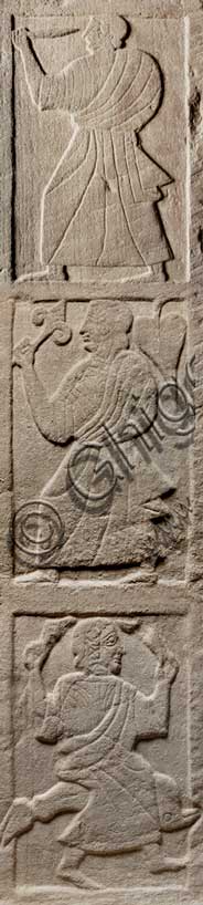 Museo Civico Archeologico di Bologna:Stele funeraria etrusca decorata su entrambi i lati e nello spessore; proveniente dal sepolcreto dei Giardini Margherita. Particolare con montaggio di metope nello spessore: 4. Donna ammantata con spada; 5. Donna con giglio (?); 6. Donna su delfino.inv. DUCATI_012