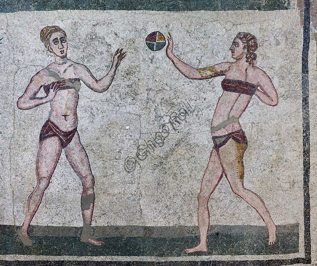 Piazza Armerina, Roman Villa of Casale, which was probably an imperial urban palace. Today it is a UNESCO World Heritage Site. Detail of the floor mosaic of the Room of the Girls representing athletes engaged in an athletics competition, wearing a two-piece swimsuit.It can be said that the girls depicted show how the bikini is a Roman invention.