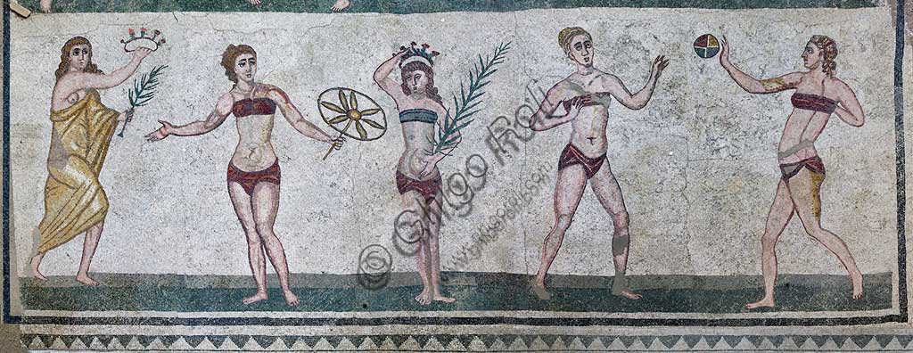 Piazza Armerina, Roman Villa of Casale, which was probably an imperial urban palace. Today it is a UNESCO World Heritage Site. Detail of the floor mosaic of the Room of the Girls representing athletes engaged in an athletics competition, wearing a two-piece swimsuit.It can be said that the girls depicted show how the bikini is a Roman invention.