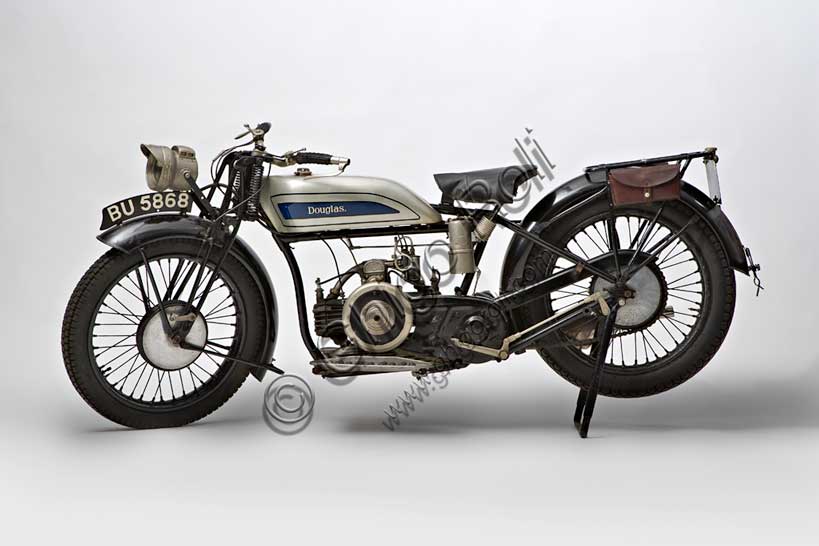 Vintage motorcycle “Douglas EW 350”Brand: Douglasmodel: EW 350country: United Kingdom - Bristolyear: 1930condition: restoreddisplacement: 348 cc (bore and stroke 60.8 x 60)engine: two-cylinder longitudinally opposed with side valvesgearbox: three-speedThe Douglas Engineering Company was founded in Bristol by brothers William and Edward in 1882 and, from a simple blacksmith's workshop, it soon transformed into a foundry to begin, with the advent of the new century, to build engines. From the first prototype in 1905 designed by Joseph Barter, they soon moved on to producing the engine with two cylinders longitudinally opposed that characterized Douglas production for many years.It was a highly appreciated motorcycle for the almost total absence of vibrations that the boxer engine design guaranteed.Douglas ceased operations in 1957.