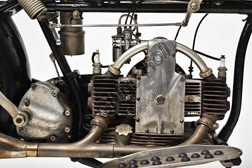 Vintage motorcycle “Douglas EW 350”Brand: Douglasmodel: EW 350country: United Kingdom - Bristolyear: 1930condition: restoreddisplacement: 348 cc (bore and stroke 60.8 x 60)engine: two-cylinder longitudinally opposed with side valvesgearbox: three-speedThe Douglas Engineering Company was founded in Bristol by brothers William and Edward in 1882 and, from a simple blacksmith's workshop, it soon transformed into a foundry to begin, with the advent of the new century, to build engines. From the first prototype in 1905 designed by Joseph Barter, they soon moved on to producing the engine with two cylinders longitudinally opposed that characterized Douglas production for many years.It was a highly appreciated motorcycle for the almost total absence of vibrations that the boxer engine design guaranteed.Douglas ceased operations in 1957.