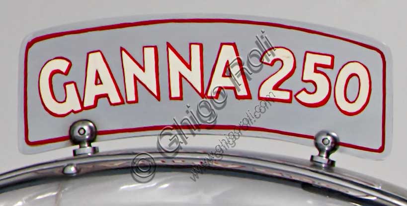 Vintage motorcycle “Ganna 250 cc. Engine”Brand: Gannamodel: 250 cccountry: Italy - Vareseyear: 1935condition: restoreddisplacement: 249 (bore and stroke 62.5 x 81)engine: Rudge Python single-cylinder with 4 overhead valves and double exhaust pipegearbox: Python four-speed, pedal-operatedLuigi Ganna was a cyclist and great champion, beating the hour record in 1908 with 40.405 km and winning, among other things, the 1909 Giro d'Italia. He began building bicycles as early as 1911, while he was still racing.He started a regular production of motorcycles in 1923, mounting Jap and Blackburne engines on his frames.This 250 from '35 was equipped with a powerful four-valve Python engine from the well-known Rudge that allowed it to reach 110 km/h.In the catalogue of the time we read:"Price Lire 4450. Supplement of Lire 75 for the pedal gear shift control, and Lire 275 for the instrument panel incorporated into the tank". 