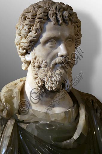  Rome, Capitolines Museums: Bust of Roman Emperor Septimius Severus (200-210 AD) of the Serapis type. Greek marble (head) and green alabaster (bust, does not belong), probably posthumous.