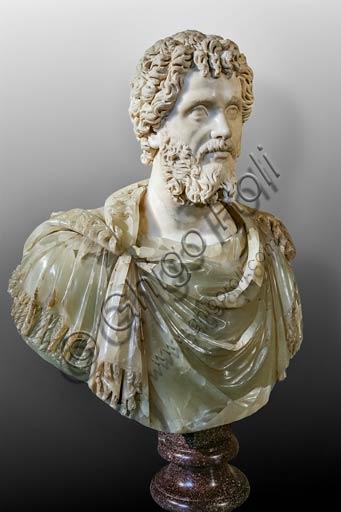  Rome, Capitolines Museums: Bust of Roman Emperor Septimius Severus (200-210 AD) of the Serapis type. Greek marble (head) and green alabaster (bust, does not belong), probably posthumous.