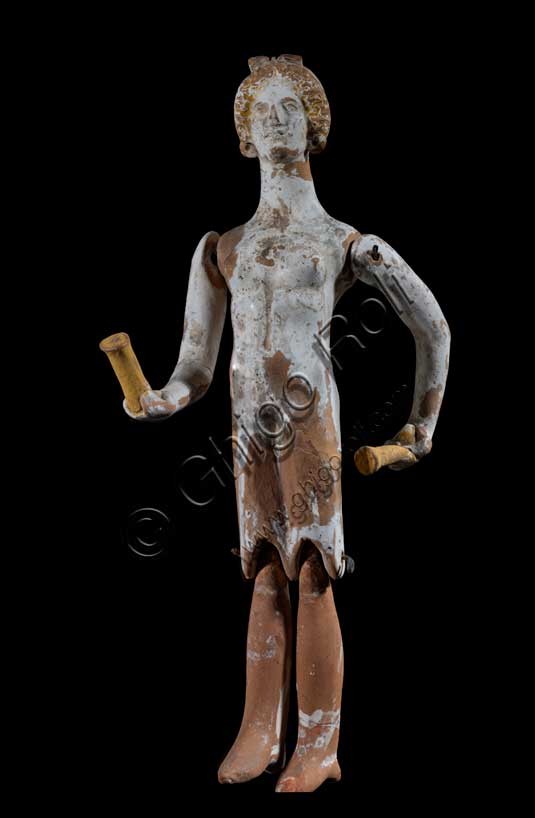 Museo Civico Archeologico di Bologna:  “bambola ad arti snodati”, terracotta, da Atene, seconda metà del IV sec. a.C.Inv. G_0858