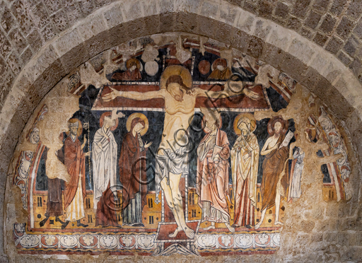 Orvieto, Badia (Abbazia dei Santi Severo e Martirio), oratorio del Crocifisso, che probabilmente era un antico e vasto refettorio: affresco dell’ultimo quarto del XIII raffigurante il Crocifisso con i Santi Maria Maddalena, Agostino, Severo, Giovanni, Elisabetta, Battista e Martirio. 