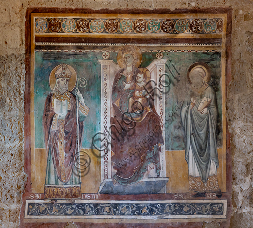  Orvieto, Badia (Abbey of St.  Severo e Martirio), oratory of the Crucifix, which probably was an ancient and vast refectory: "Madonna enthroned with the Saints Augustine and Severus",fresco from the last quarter of the XIII century.