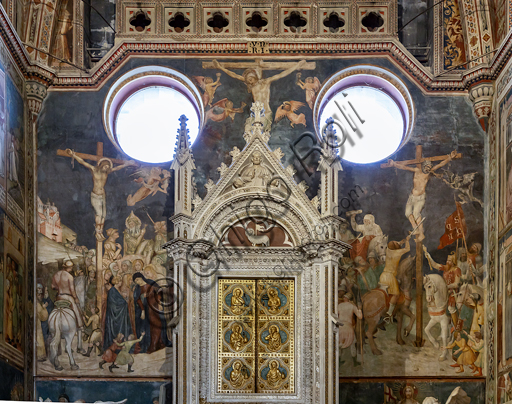  Orvieto,  Basilica Cathedral of Santa Maria Assunta (or Duomo), the interior: the Chapel of the Corporale with the marble tabernacle designed by Niccolò da Siena (1385) and then continued under the direction of the Orcagna. The frescoes are by Ugolino di Prete Ilario and others. (1357-64).