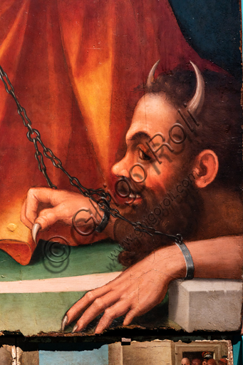  Perugia, National Gallery of Umbria: "Altarpiece of the nuns of St. Juliana" and predella with the stories of the life of St. Juliana, by Domenico Alfani, 1532. Oil painting. Detail of the altarpiece with chained devil and .