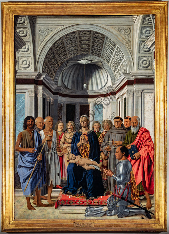 “Pala di Brera, o Pala Montefeltro (Sacra Conversazione con la Madonna col Bambino, sei santi, quattro angeli e il donatore Federico da Montefeltro)”, Piero della Francesca, tempera e olio su tavola, databile al 1472 circa.