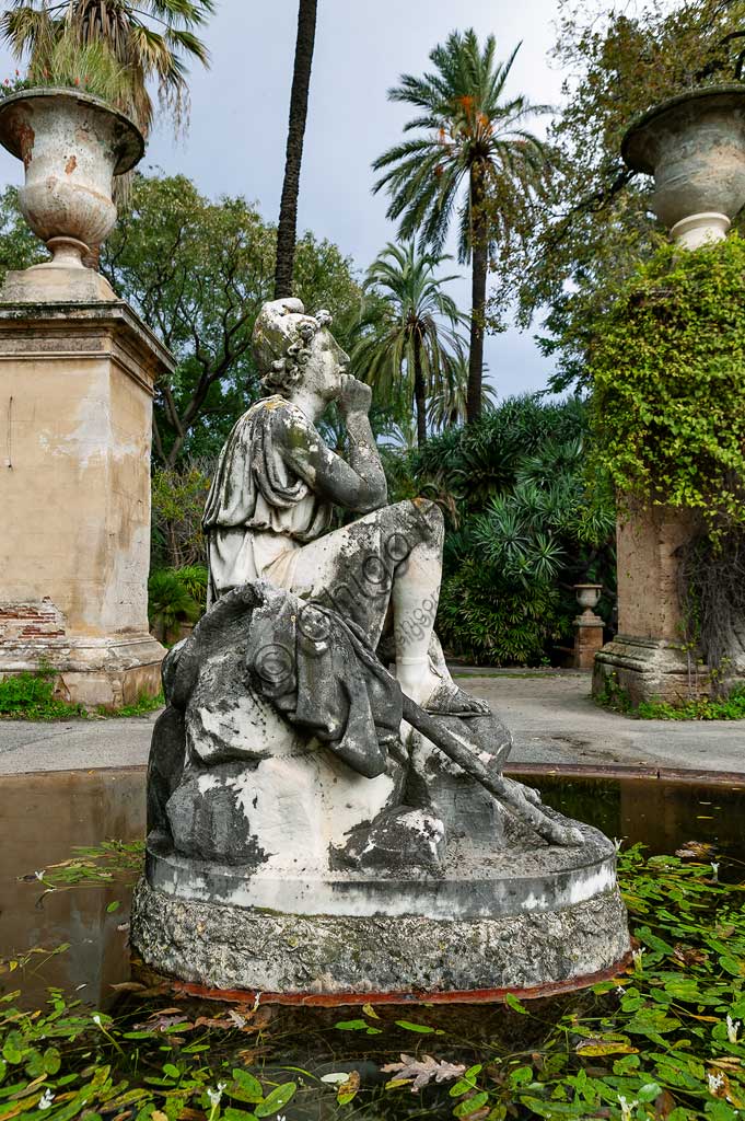 Palermo, the Botanical Gardens: a fountain with a statue.