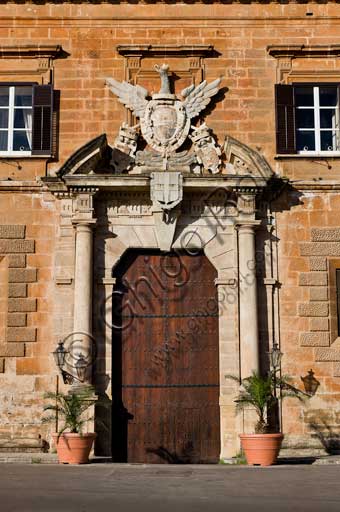 Palermo, The Royal Palace or Palazzo dei Normanni (Palace of the Normans), North-East side: the main portal of the Renaissance wing with the coat of arms with an Aragon eagle.