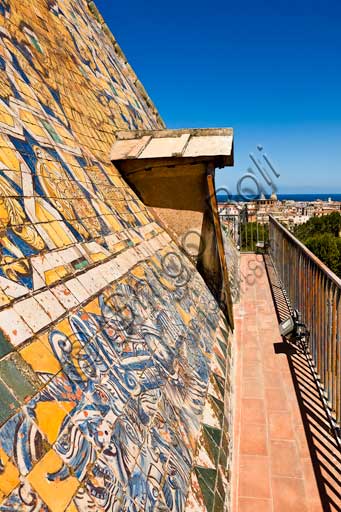 Palermo, The Royal Palace or Palazzo dei Normanni (Palace of the Normans): the Porta Nuova Tower. In the foreground the pyramidal roof covered with polychrome majolica tiles with the image of an eagle with spread wings, designed by the architect Gaspare Guercio in 1663. 