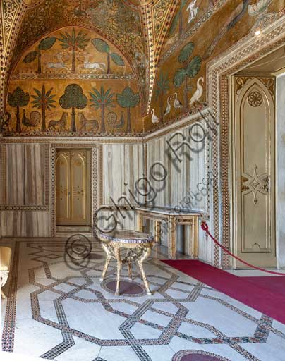 Palermo, The Royal Palace or Palazzo dei Normanni (Palace of the Normans), Pisana Tower,  the King Roger Room: view of the Room which was commissioned by King Roger II d'Altavilla. It is characterized by large mosaic surfaces of great value representing plant elements (palms and banana trees) and scenes of courtly and hunting style, symbols of the Norman power (hunting scenes with archers and deer, peacocks, swans, and mythological centaurs, griffins and other exotic animals including leopards and tigers among luxuriant vegetation). Mosaics are characterised by Greek Byzantiene style (XIII century).