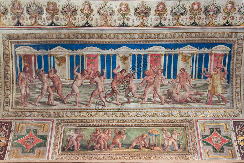 Ferrara, the Castello Estense (the Estense Castle), also known as Castle of St. Michael: detail of the ceiling of the Hall of Games,"The Pancrazio (a merging of Wrestling and boxing)". The frescoes are designed by Pirro Ligorio. The realization " is by Leonardo da Brescia.